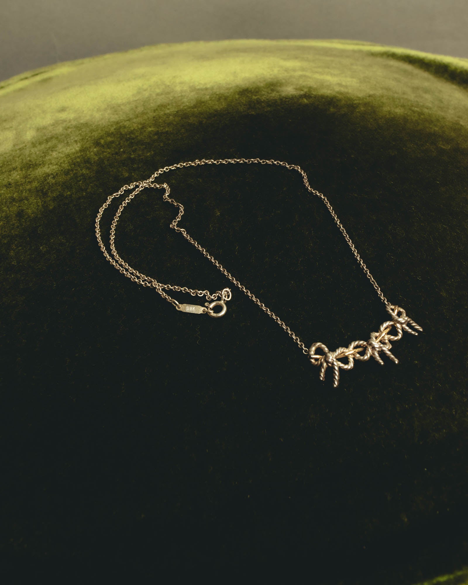 "Tiffany & Co." 80's-90's Sculptural triple bow necklace