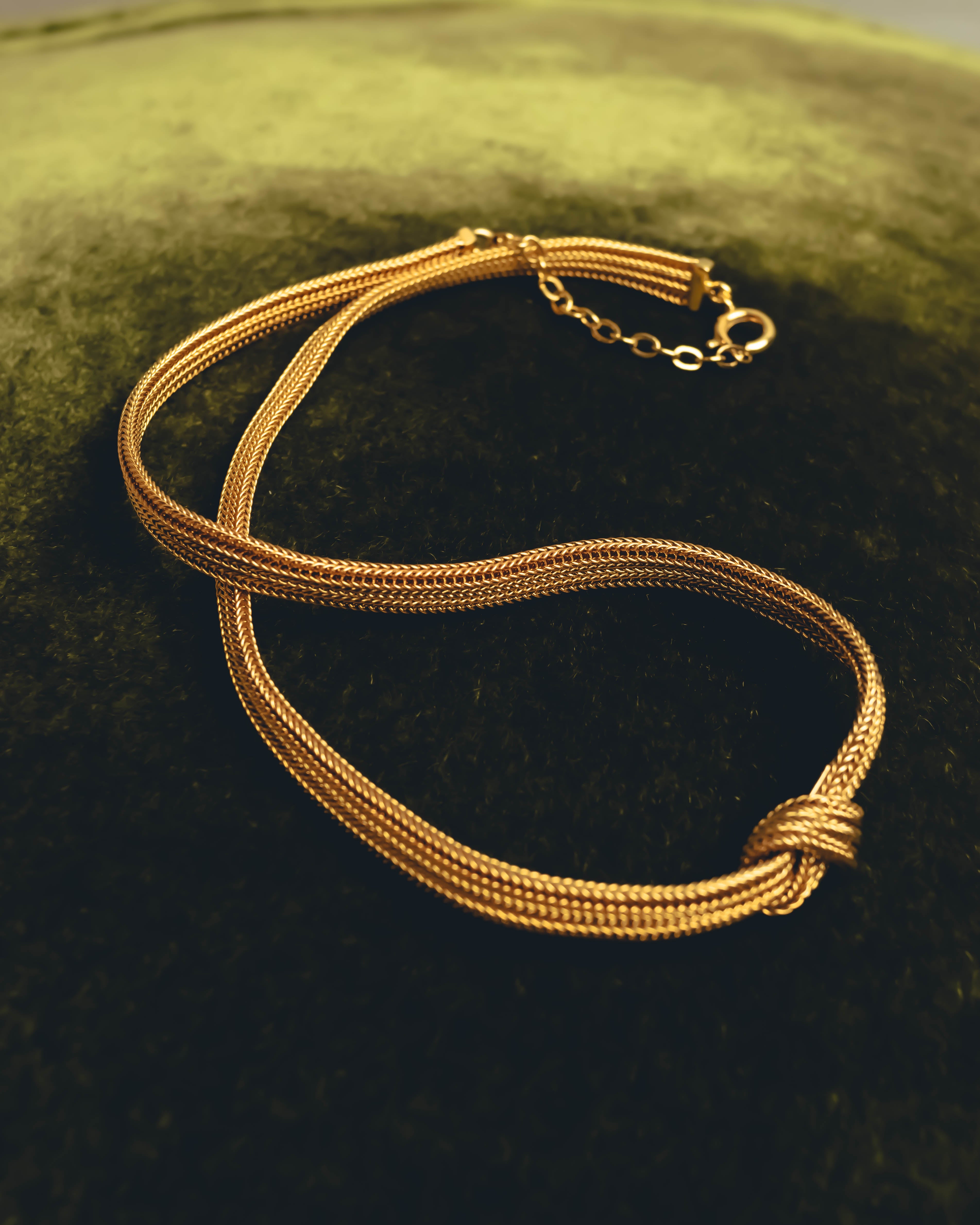 "Christian Dior" Gold tone braided knot costume jewelry necklace