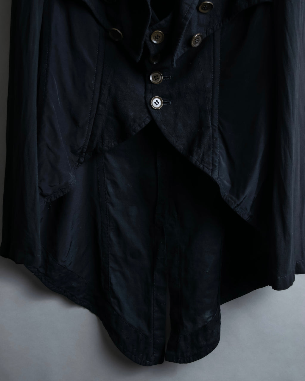 “Y’s COMPOSITION: SEE ATTACHED LABEL” Layered design multi buttons tail coat