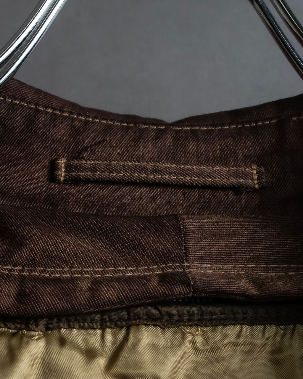 "CHRISTIAN DIOR MONSIEUR"
 Dark brown oversized trench coat