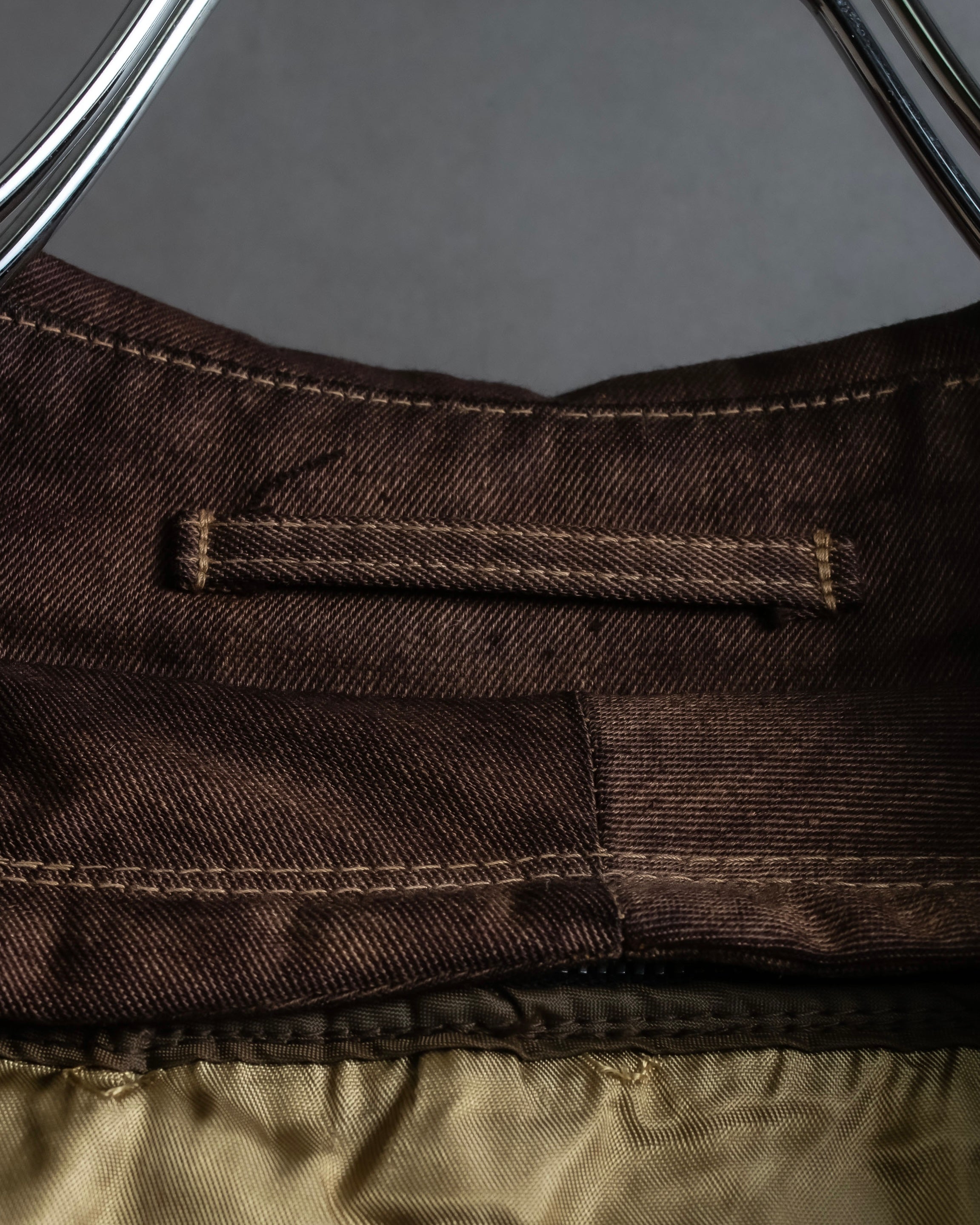 "CHRISTIAN DIOR MONSIEUR"
 Dark brown oversized trench coat