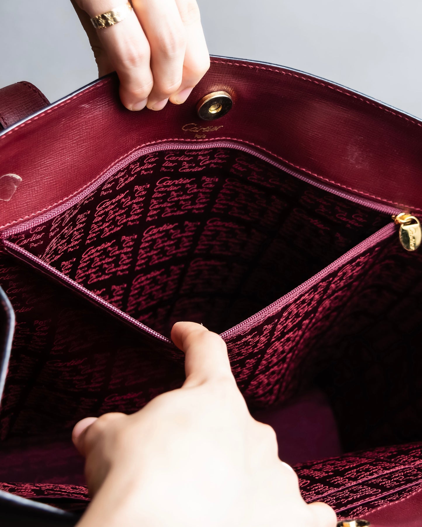 "Cartier" Jewelry ruby color leather tote bag