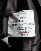 "HARVEY LOGAN" Diagonal cut design lamb leather flare skirt