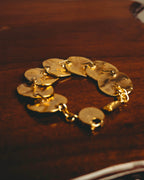 -SPECIAL- “Yves Saint Laurent” 80’s-90’s Hammered gold coin link bracelet
