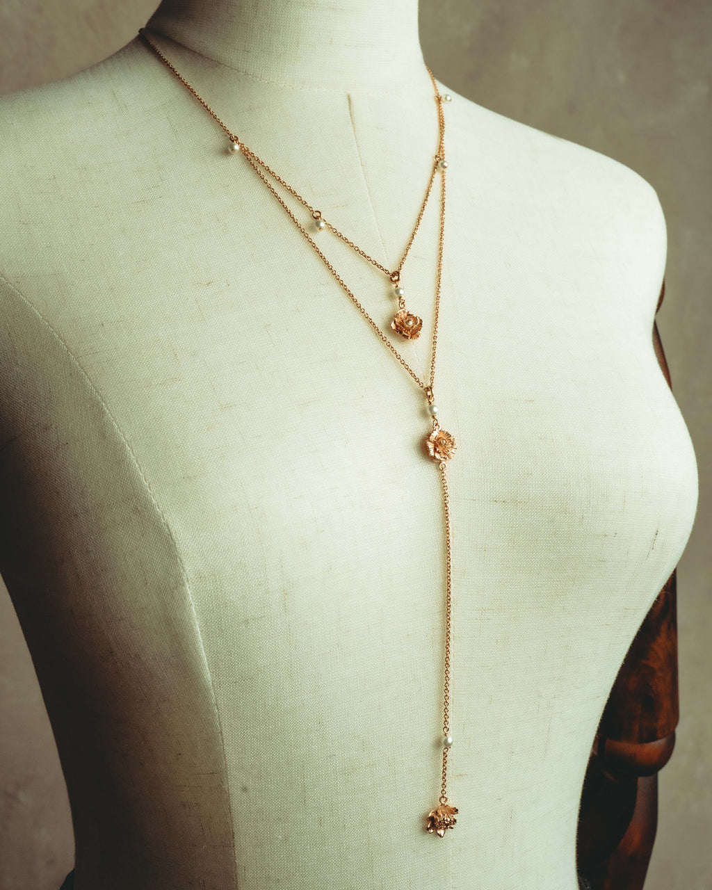 “Christian Dior” 2019-2025 Gold floral charm necklace with pearl accents