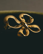 "Yves Saint Laurent" Sculptural gold bow brooch