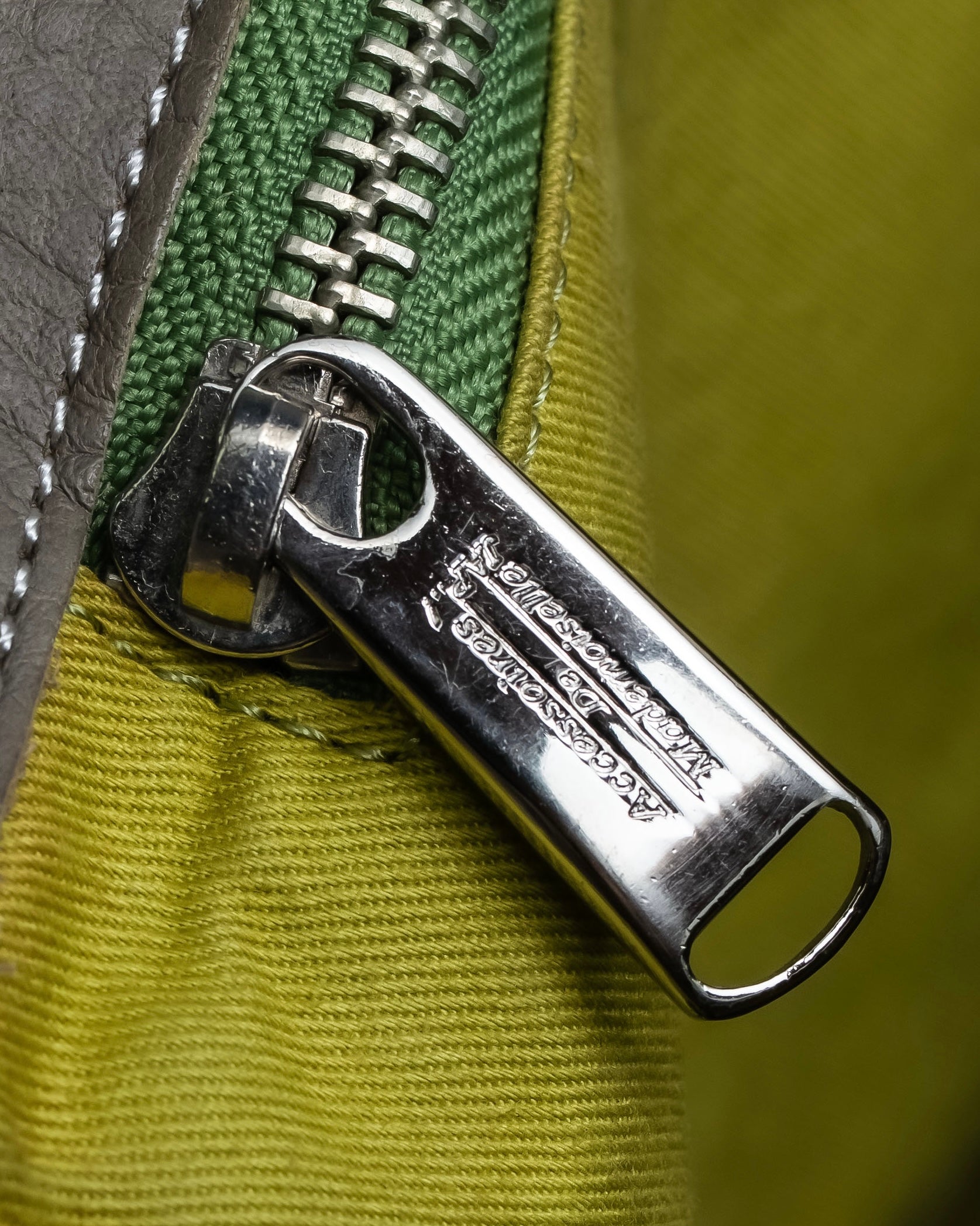 "Mademoiselle Accessories"
 Silver parts design leather one handle bag