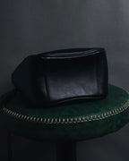 "Y’s" 22AW sculptural kiss-lock leather bag