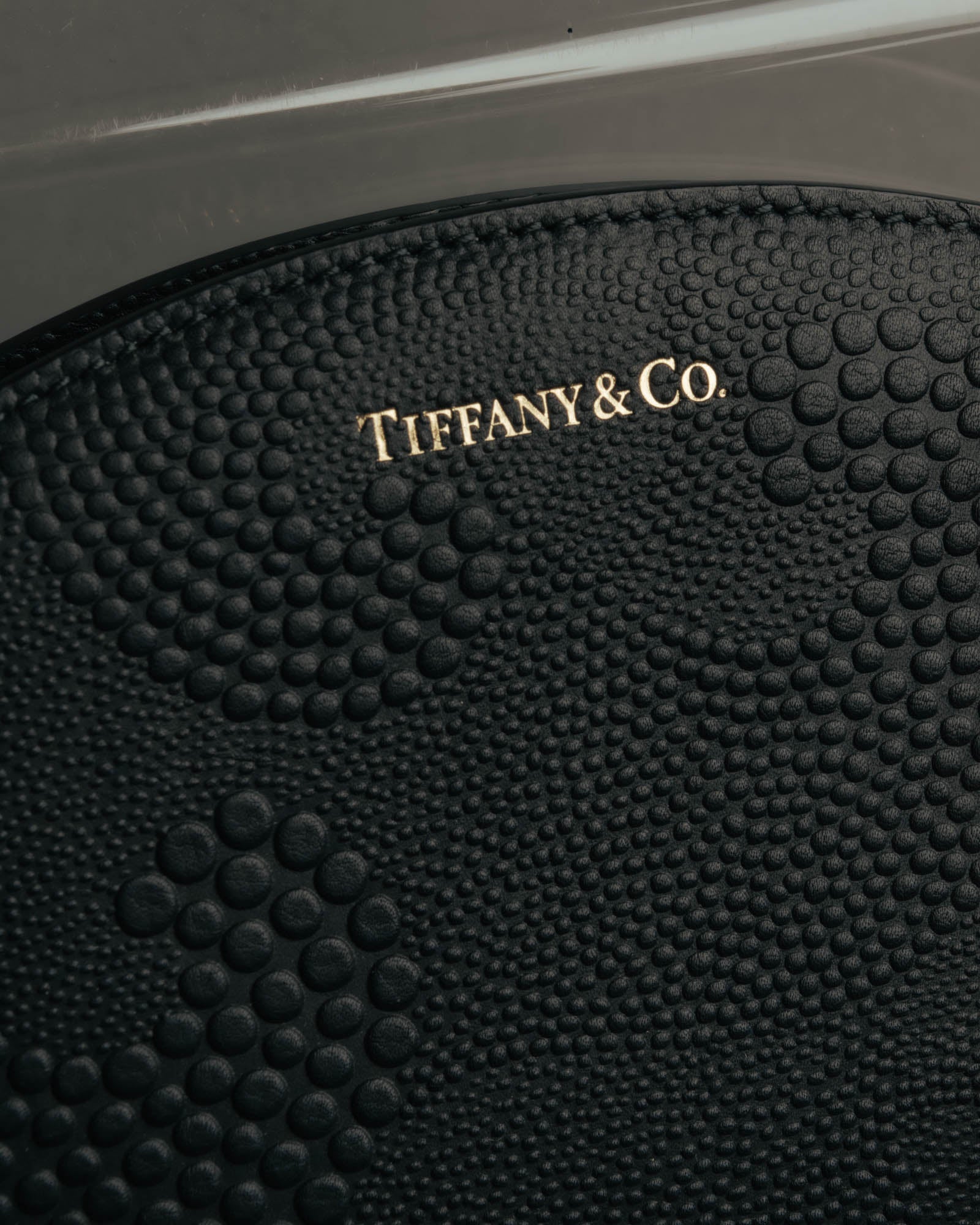 "Tiffany & Co." 10's-20's Embossed leather wristlet wallet