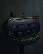 "YVES SAINT LAURENT" 2008-2012 Muse to icon clasp leather and canvas top handle bag