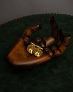 "CHANEL" Dome relief cross motif gold cufflinks