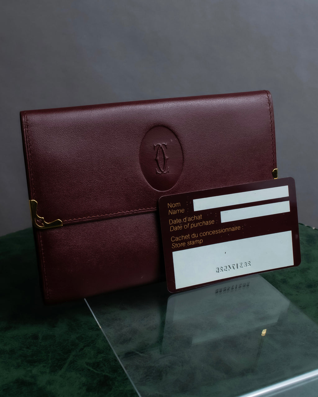 "Cartier" Les Must de Cartier bordeaux color leather wallet