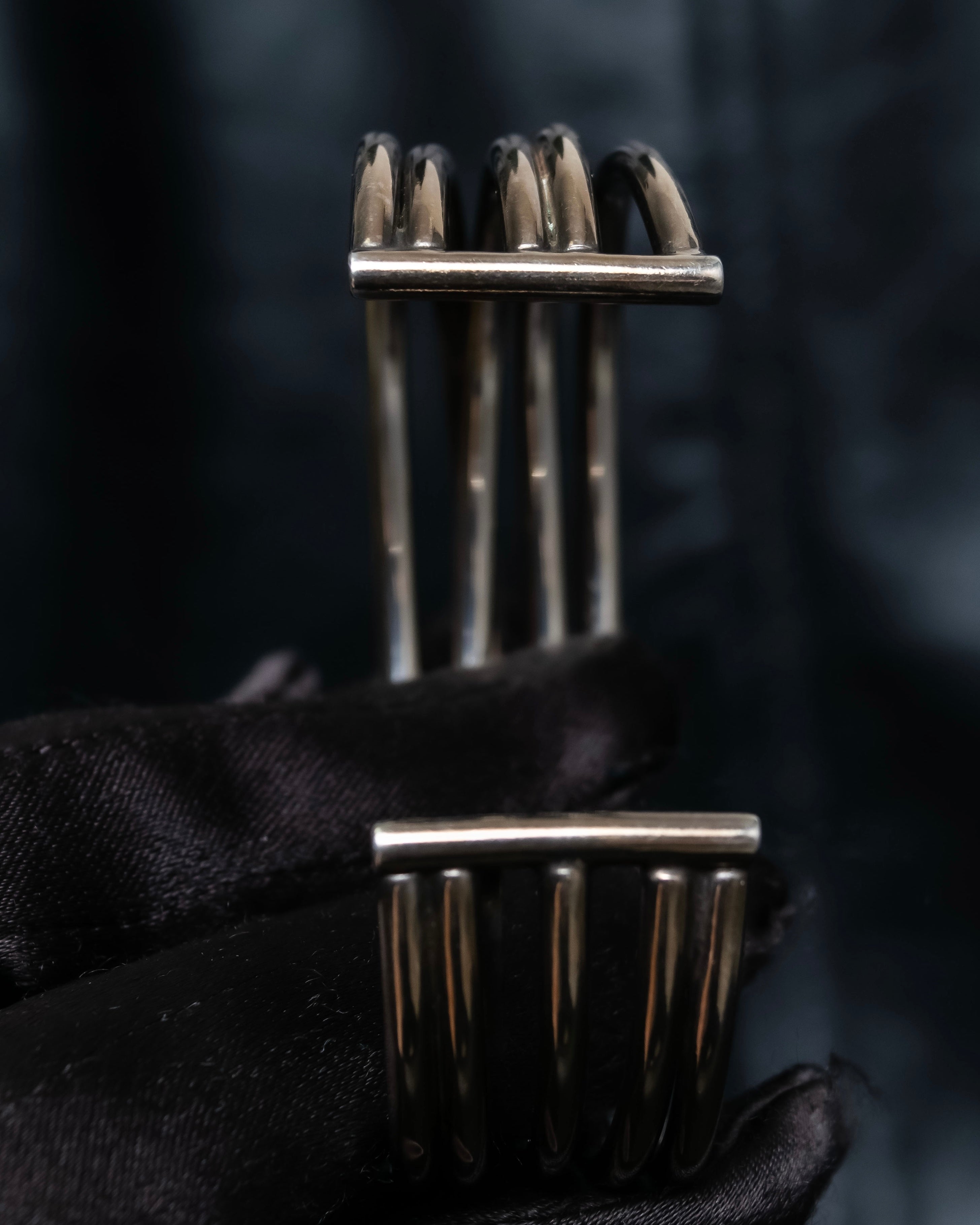 “PHILIPPE AUDIBERT” Crossed 5 line silver bangle