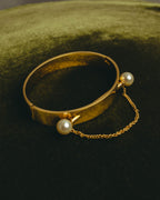 "Chloé" 2010's Gold tone pearl hinged cuff bracelet