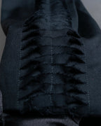 "MAISON MARGIELA" Side cross fringe design wool tapered slacks