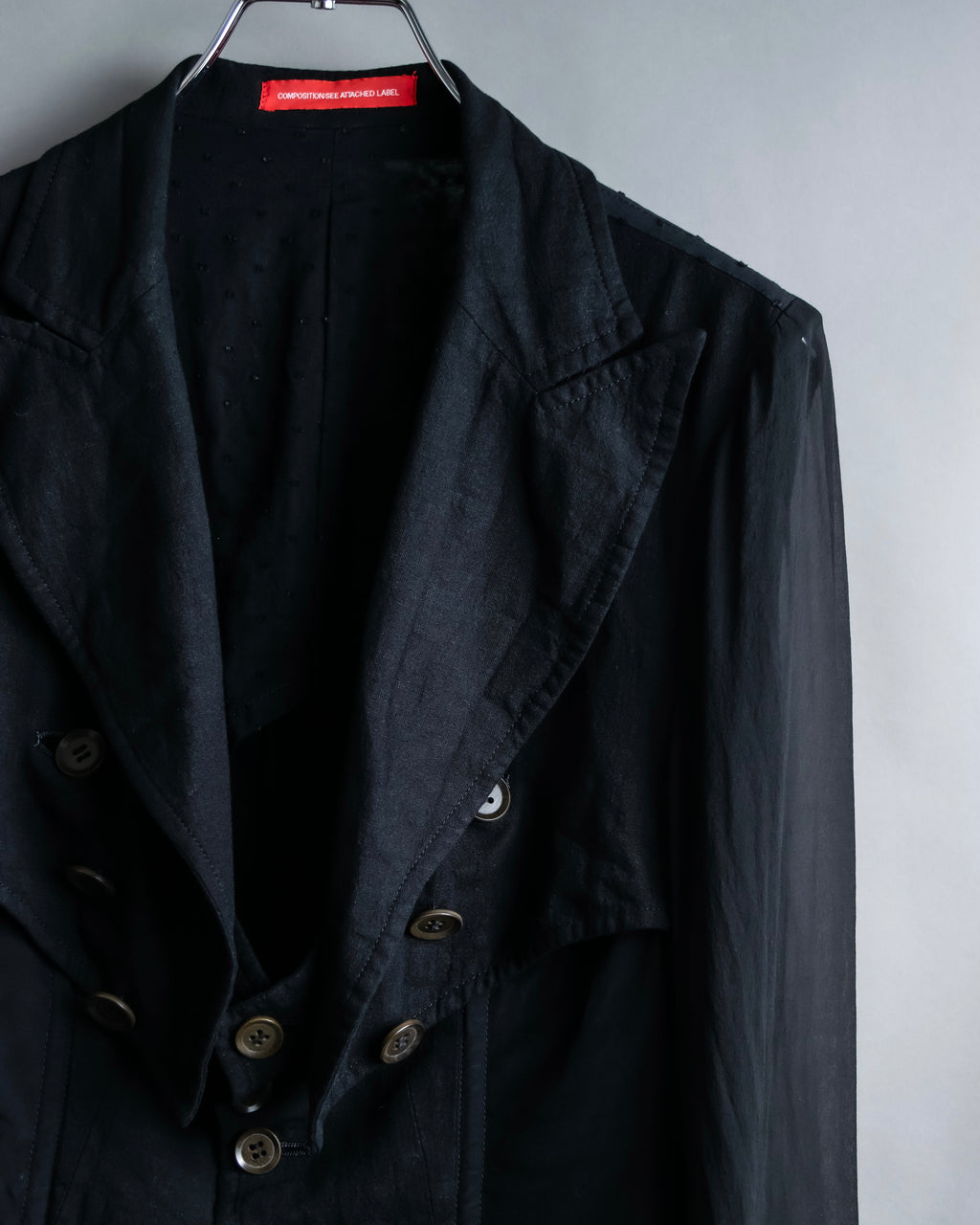 “Y’s COMPOSITION: SEE ATTACHED LABEL” Layered design multi buttons tail coat