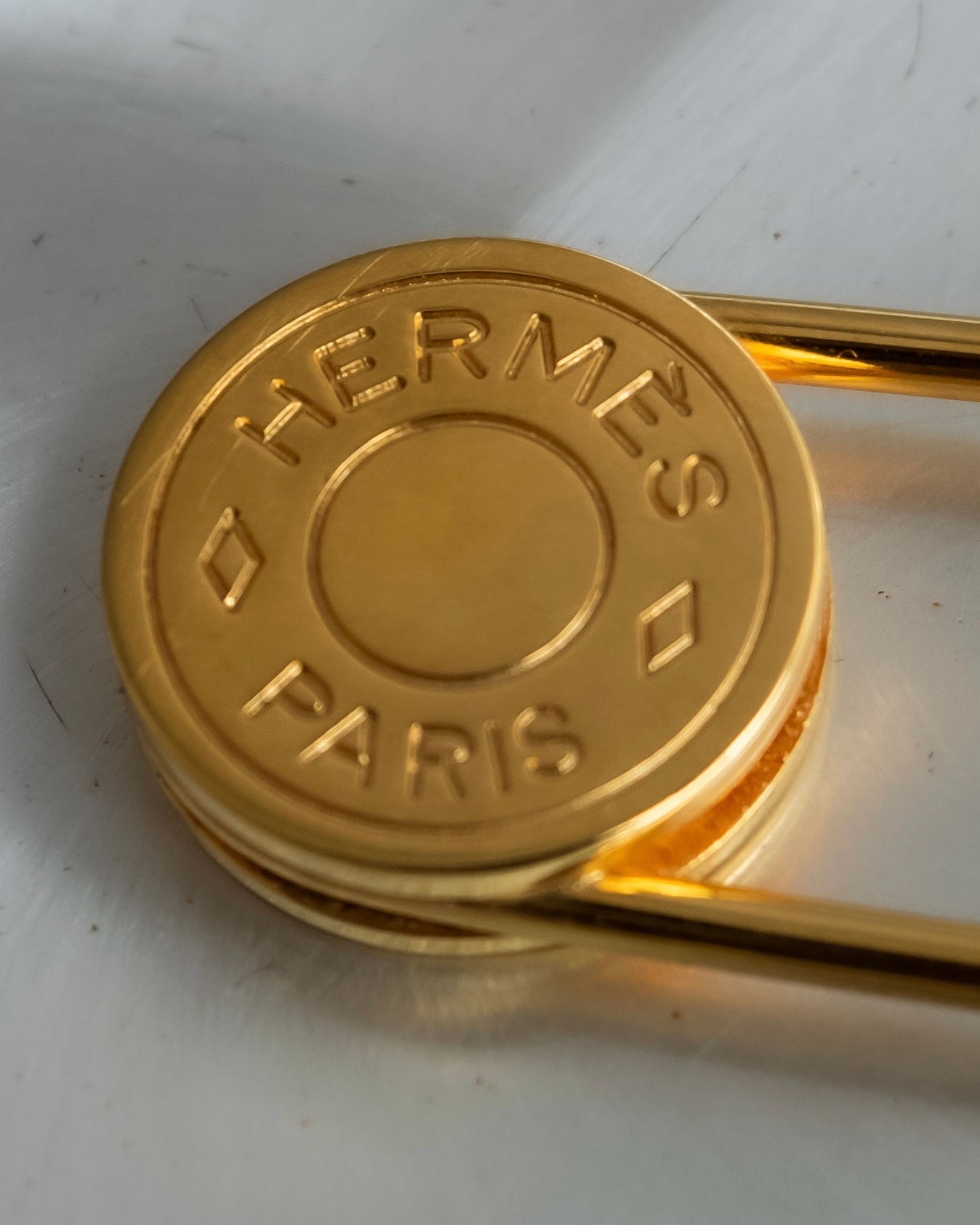 "HERMES" Metal gold logo engraving pin