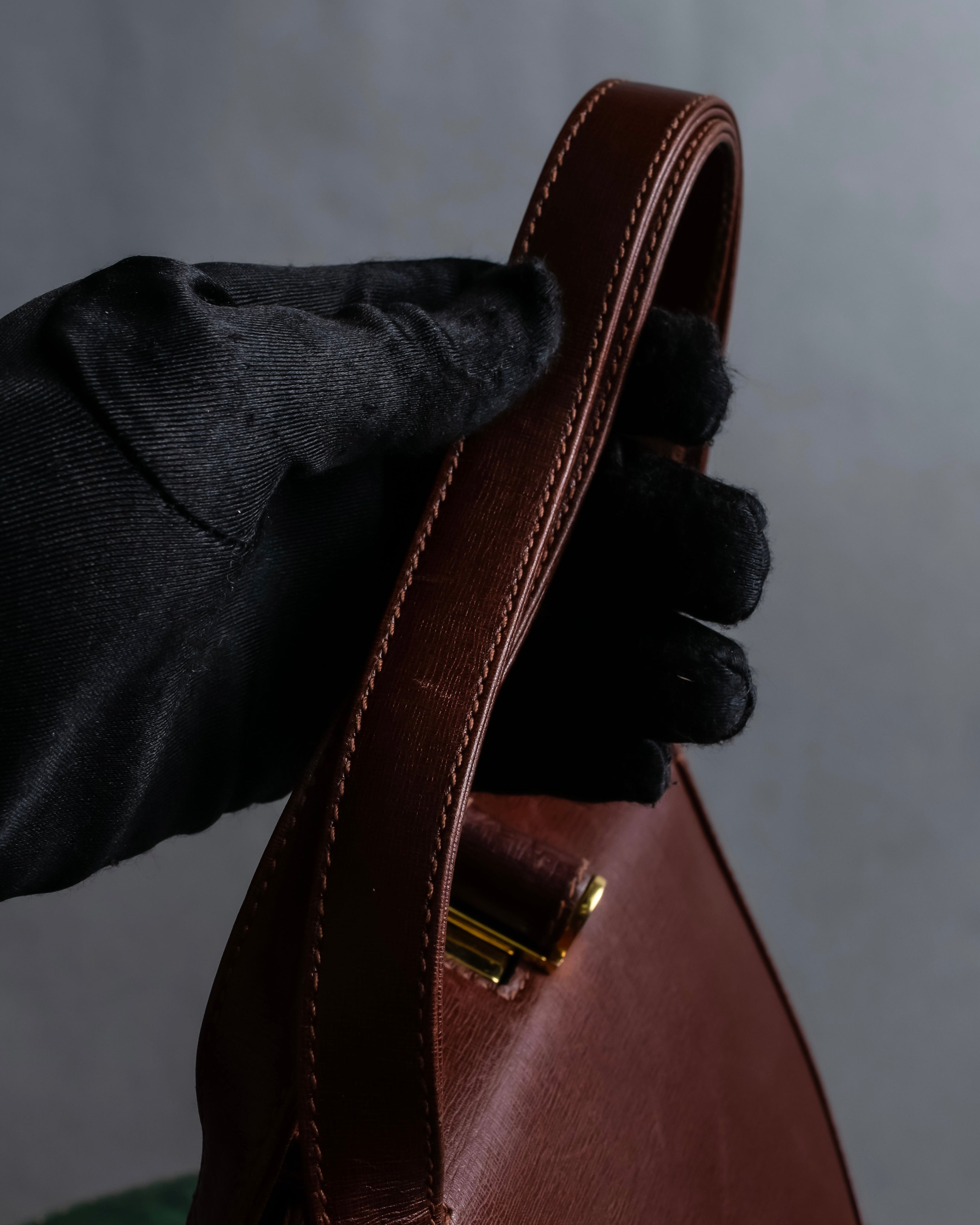 "Salvatore Ferragamo" Half-moon shaped Bordeaux color leather shoulder bag