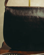 “Yves Saint Laurent” 70’s-80’s Perforated logo leather tassel shoulder bag