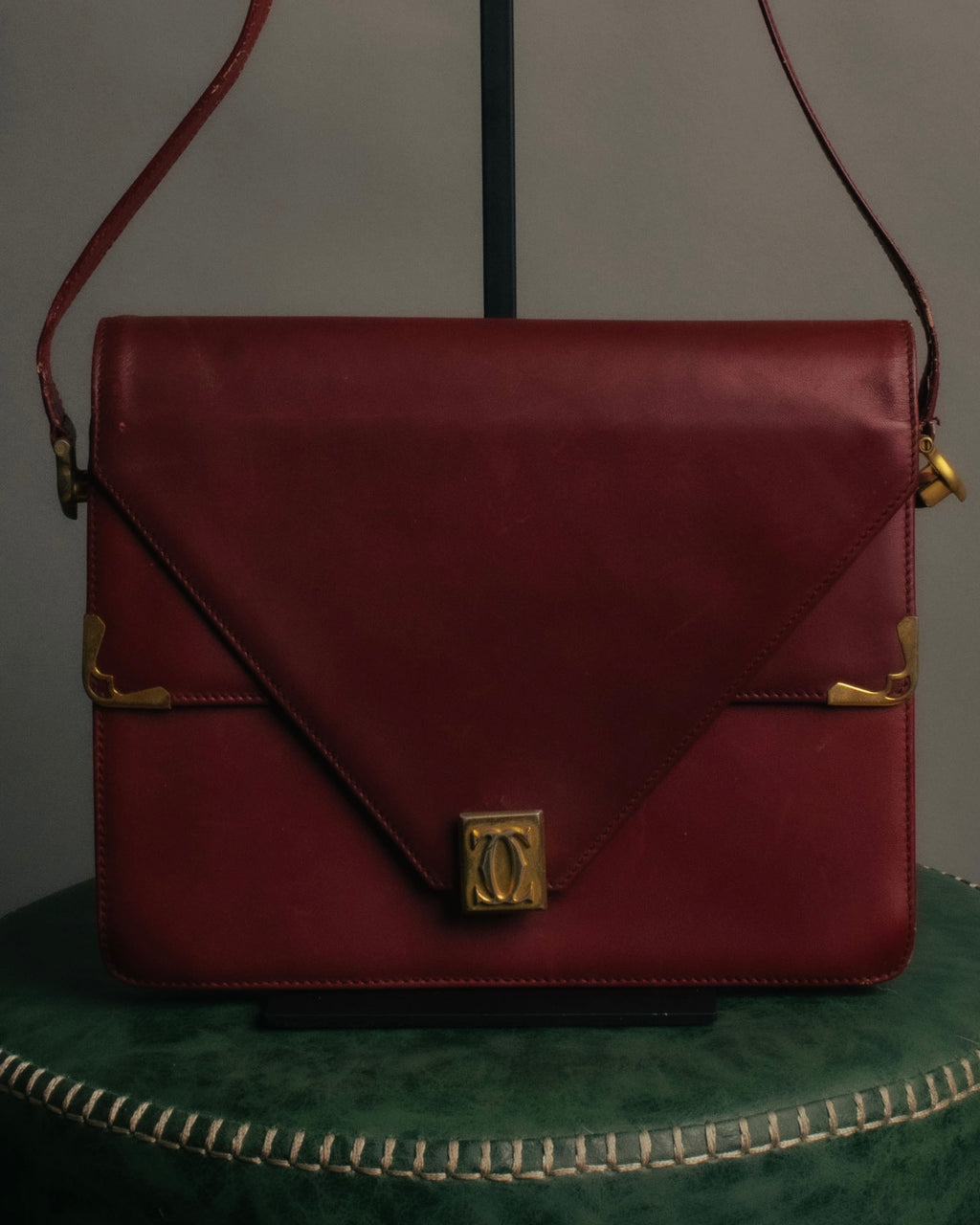 “Cartier” 80’s-90’s Must de Cartier burgundy leather shoulder bag
