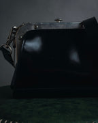 "tricot COMME des GARÇONS" Structured kiss-lock leather shoulder bag