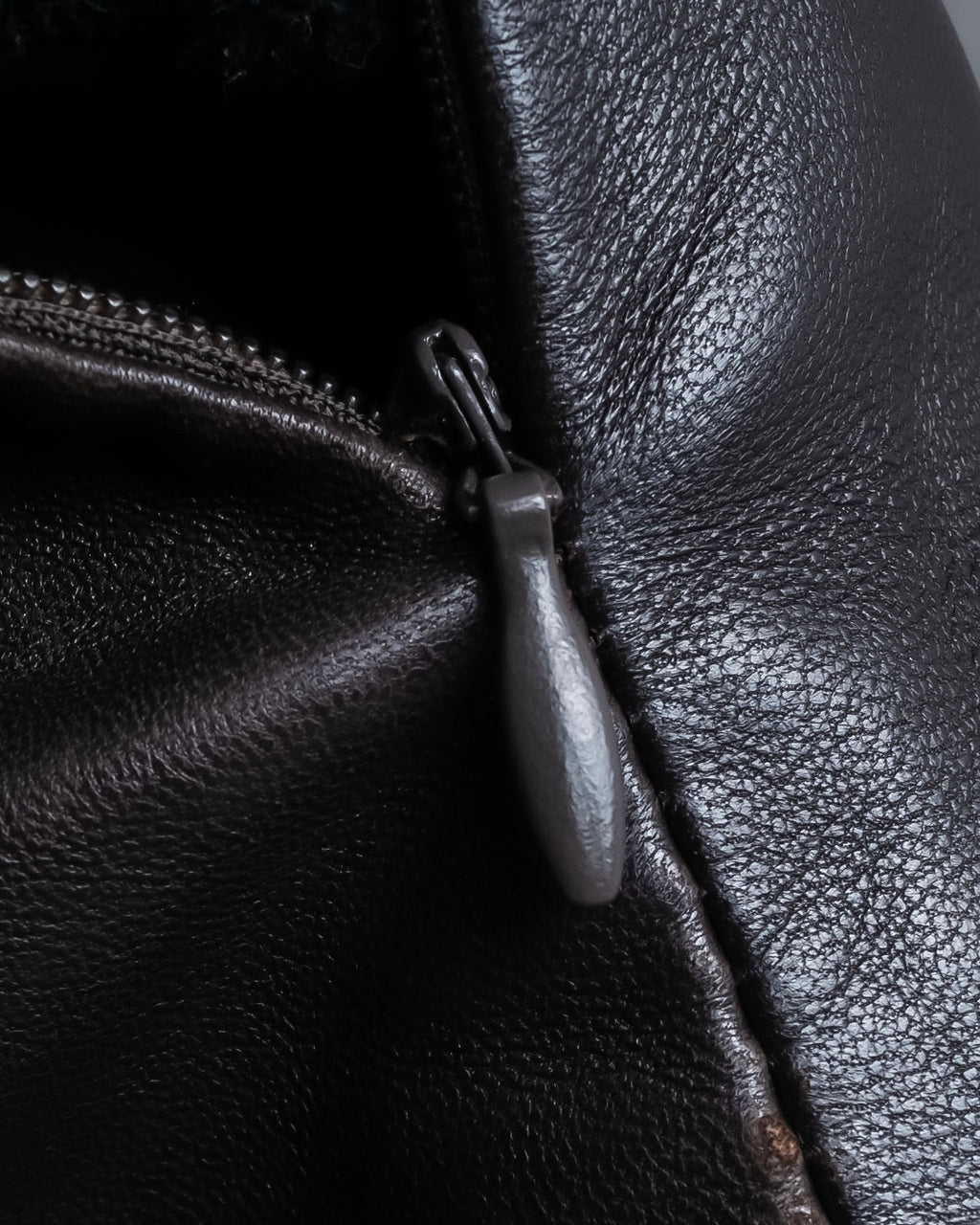 "HARVEY LOGAN" Diagonal cut design lamb leather flare skirt