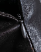 "HARVEY LOGAN" Diagonal cut design lamb leather flare skirt