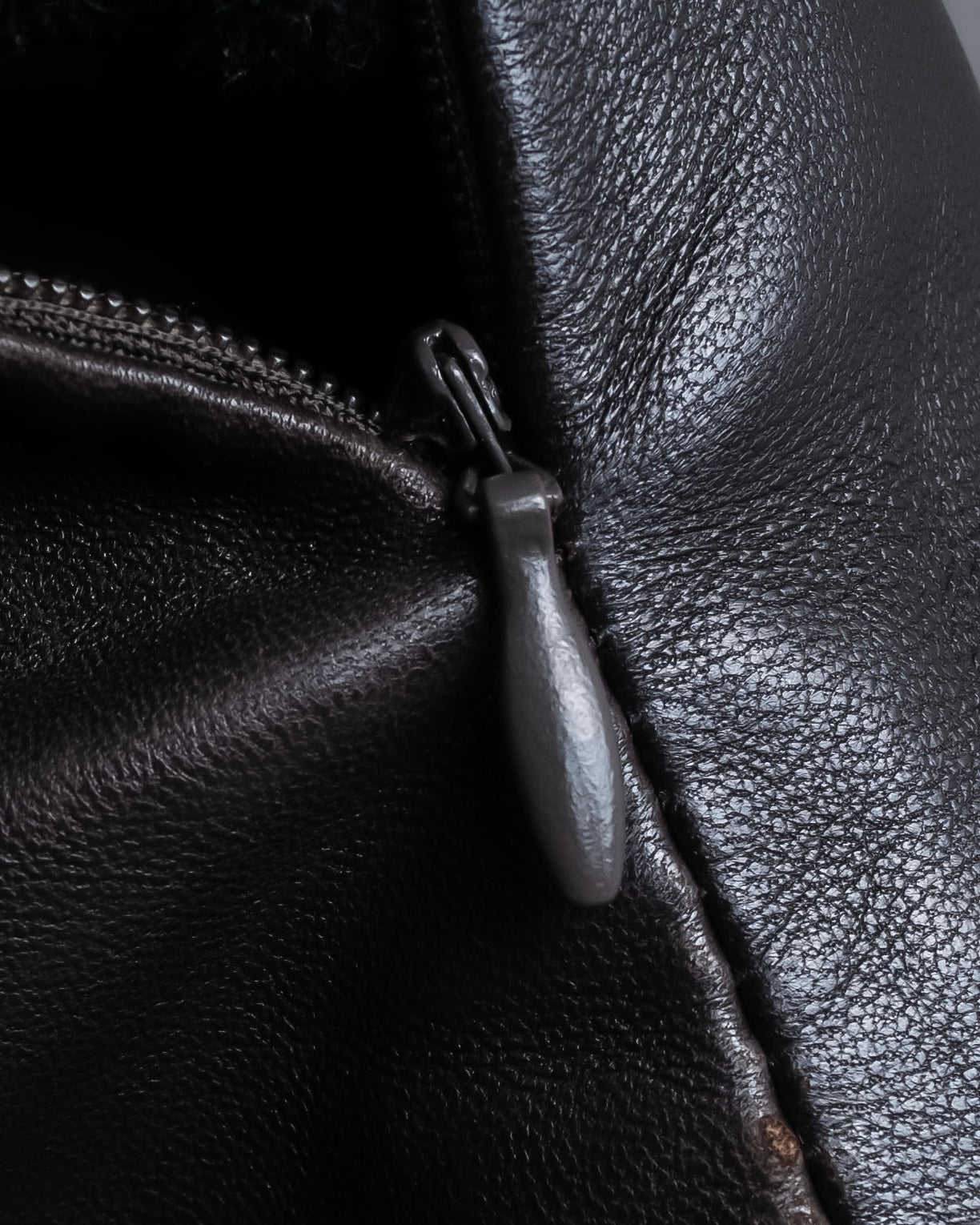 "HARVEY LOGAN" Diagonal cut design lamb leather flare skirt