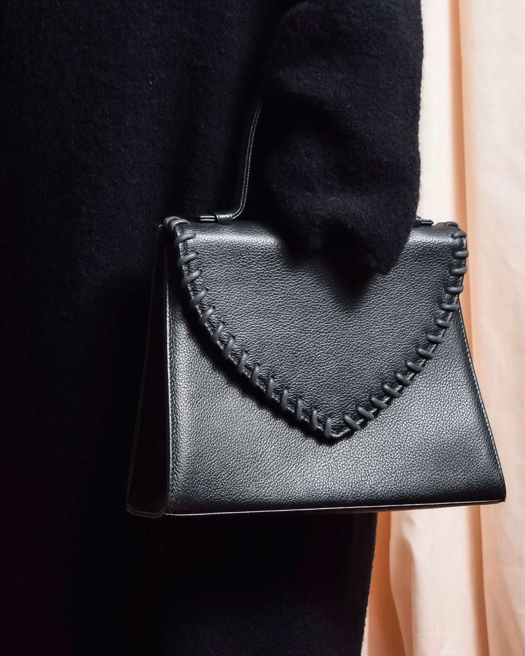 "YVES SAINT LAURENT" Hand stitched design trapezoid leather bag