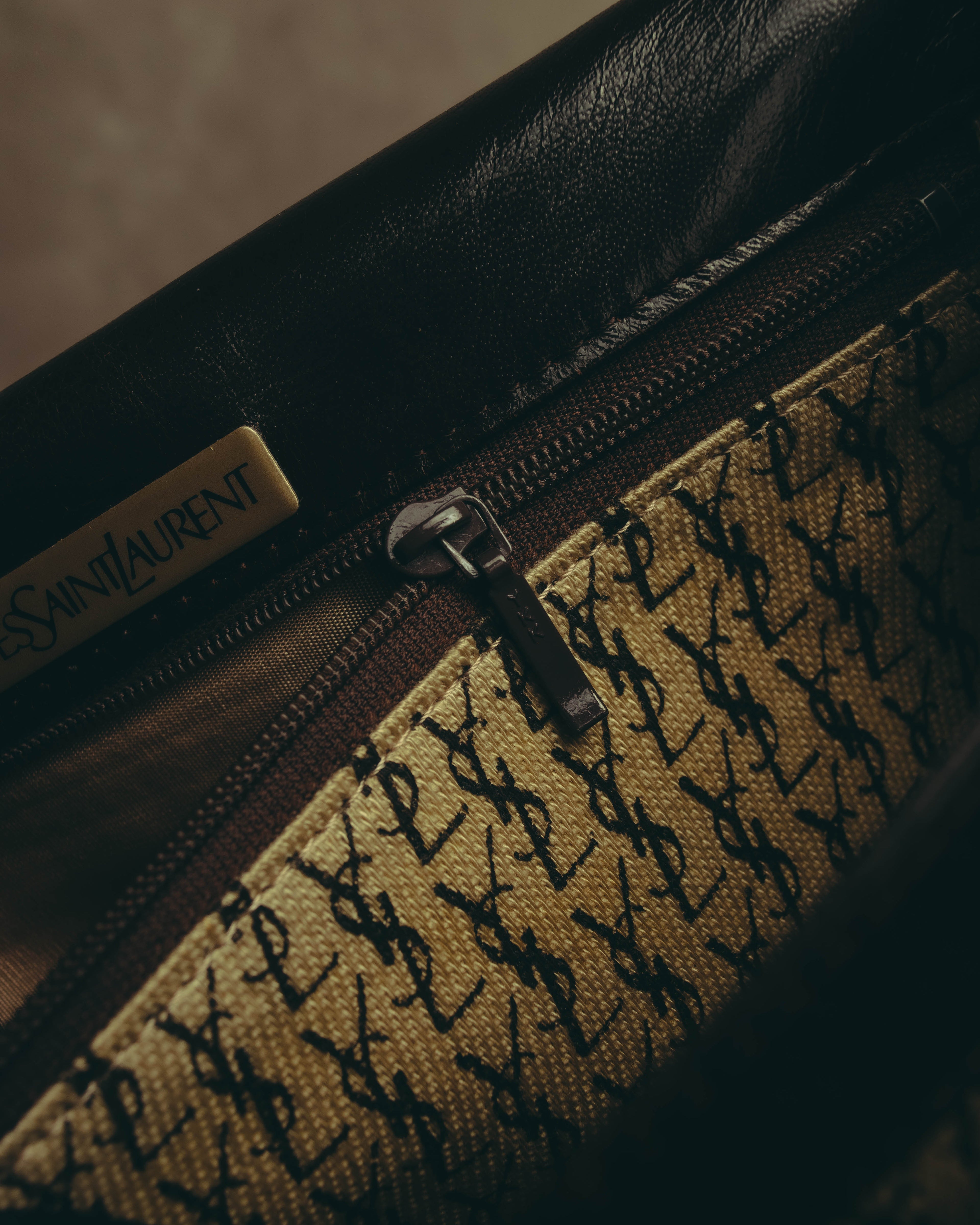 “Yves Saint Laurent” 70’s-80’s Perforated logo leather tassel shoulder bag