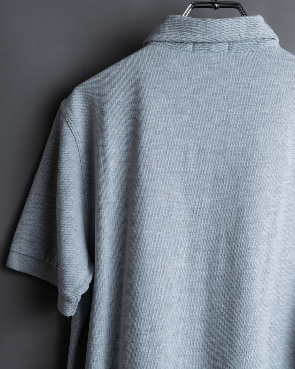 "BURBERRY" Knight logo engraved metal button polo shirt