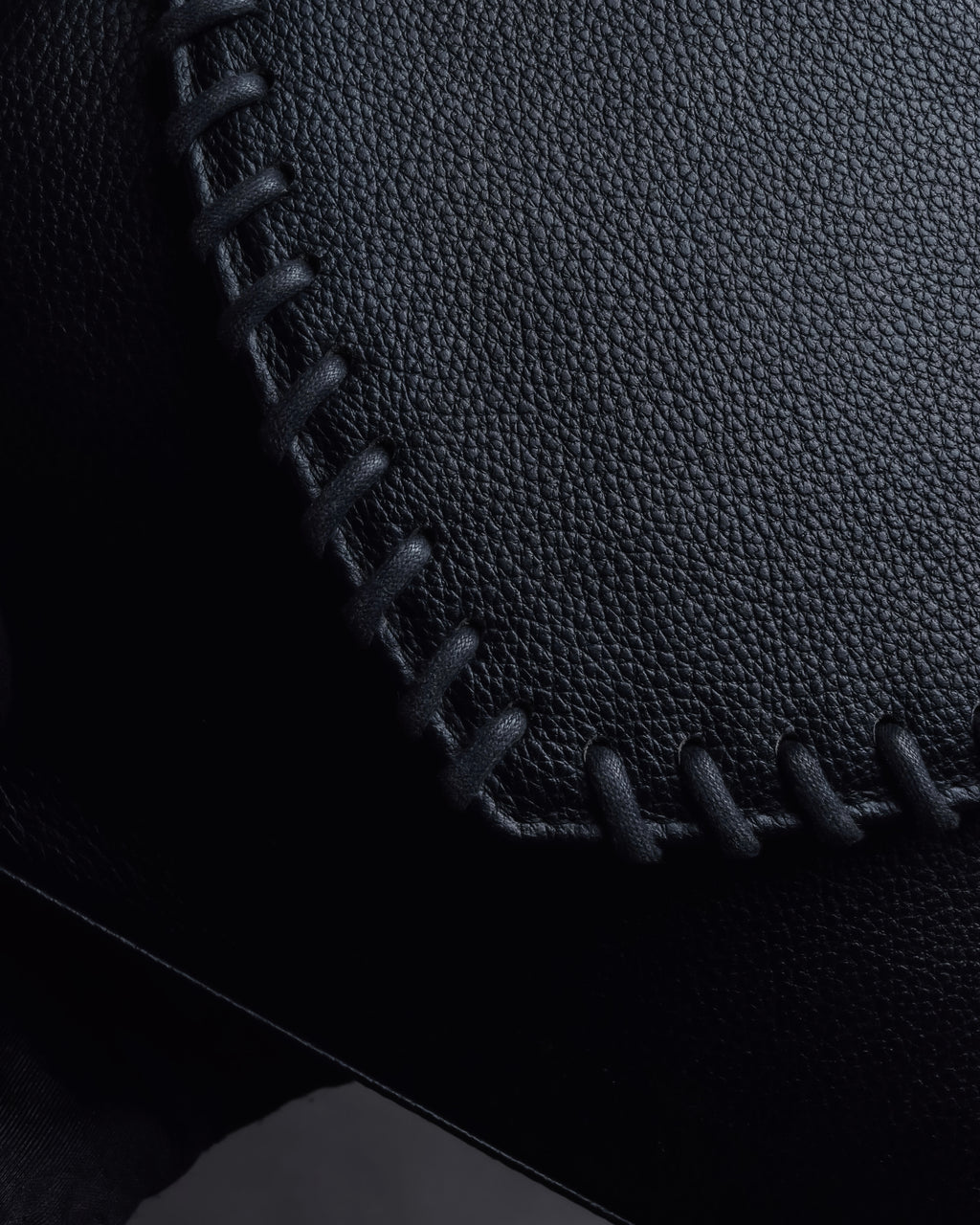 "YVES SAINT LAURENT" Hand stitched design trapezoid leather bag