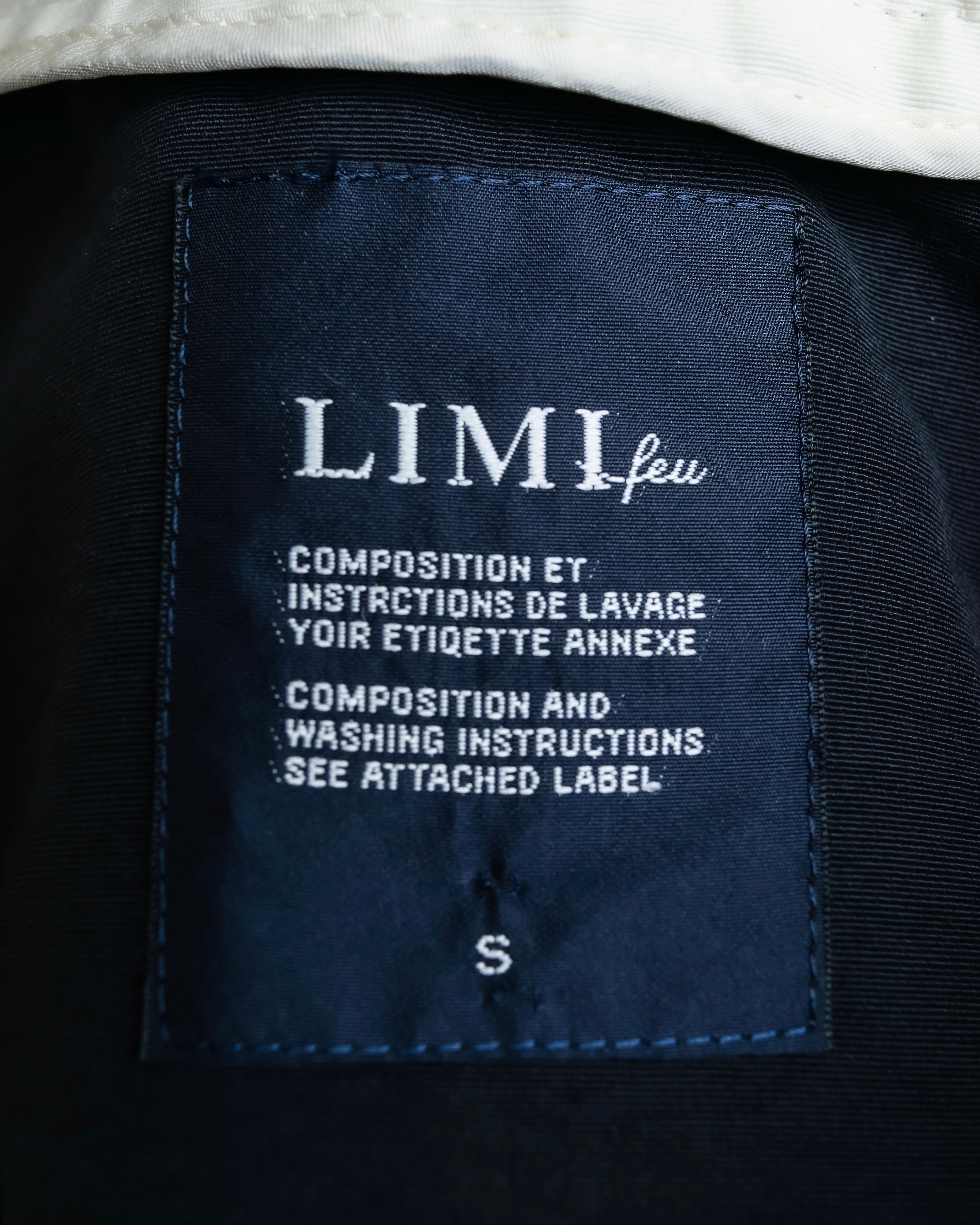 "LIMI feu" Cleric design inverted V-shaped hem short length jacket