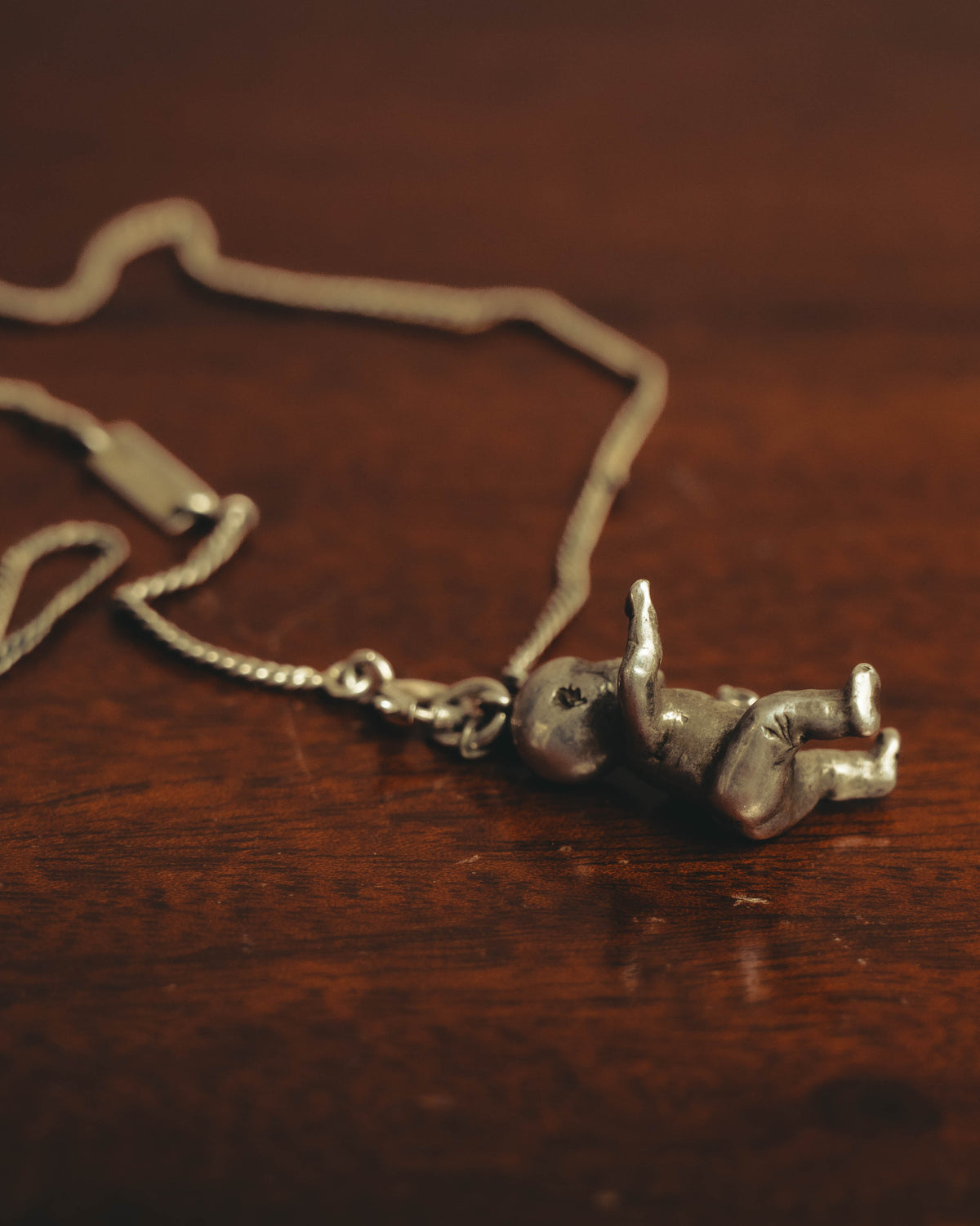 "Saint Laurent" 10's-20's Sculptural doll pendant necklace