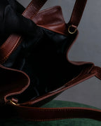 "Salvatore Ferragamo" Half-moon shaped Bordeaux color leather shoulder bag