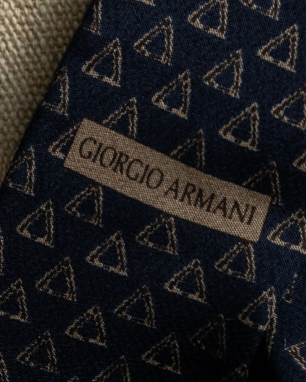 "ARMANI COLLEZIONI" Repeated triangle motif silk neck tie