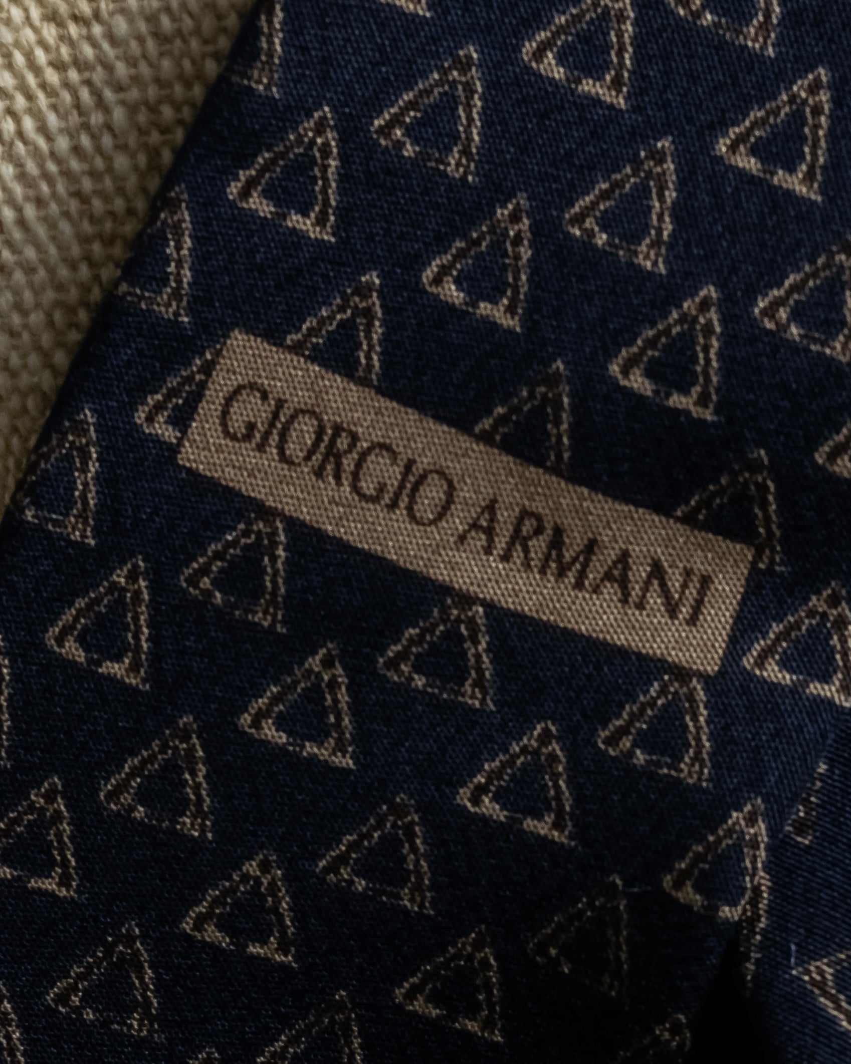 "ARMANI COLLEZIONI" Repeated triangle motif silk neck tie
