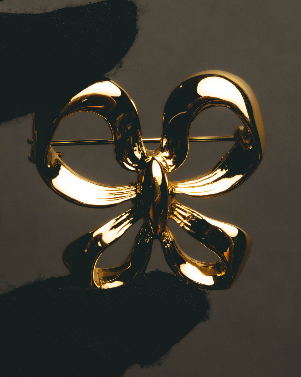 "Yves Saint Laurent" Sculptural gold bow brooch
