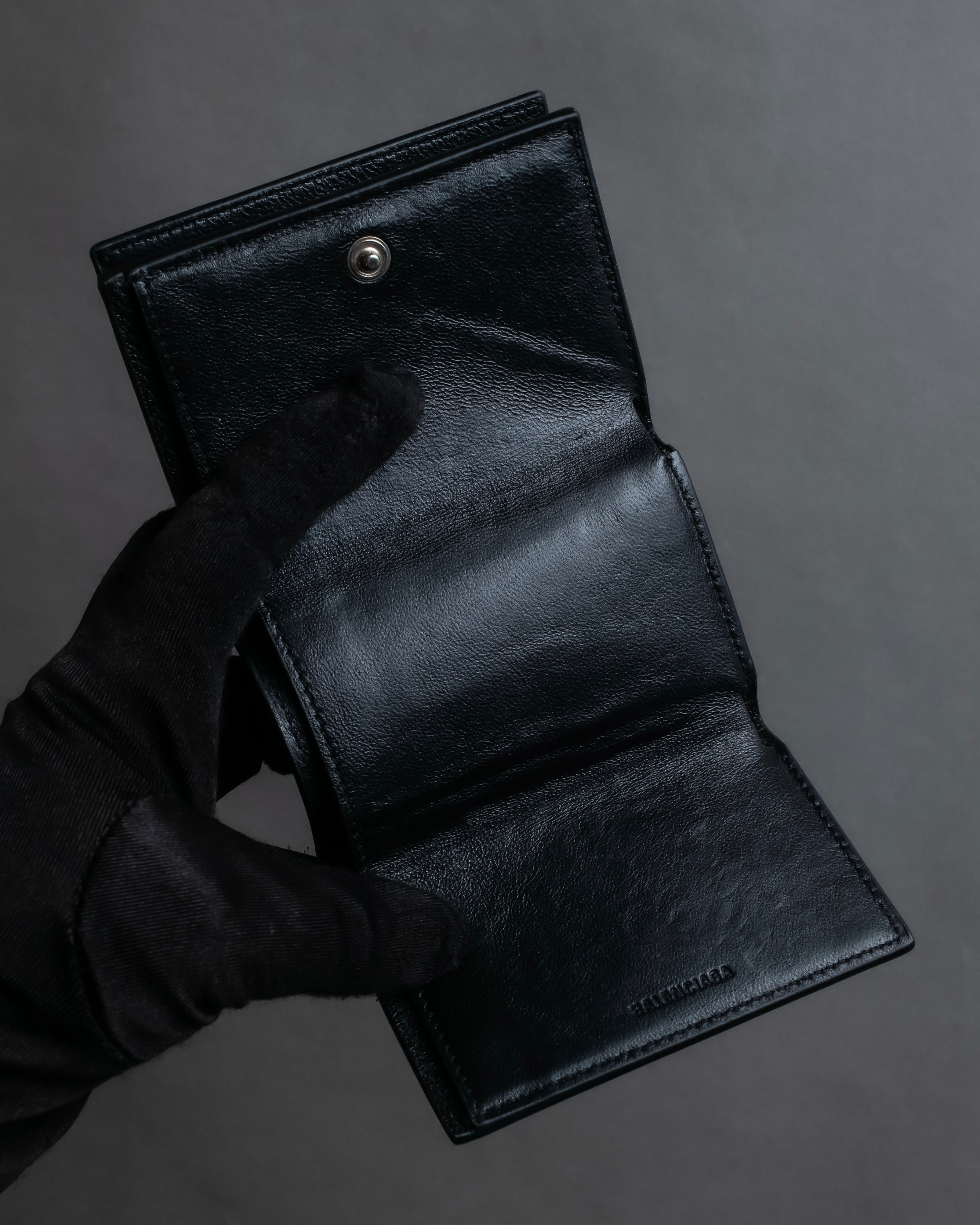 "BALENCIAGA" Logo engraved compact leather tri-fold wallet