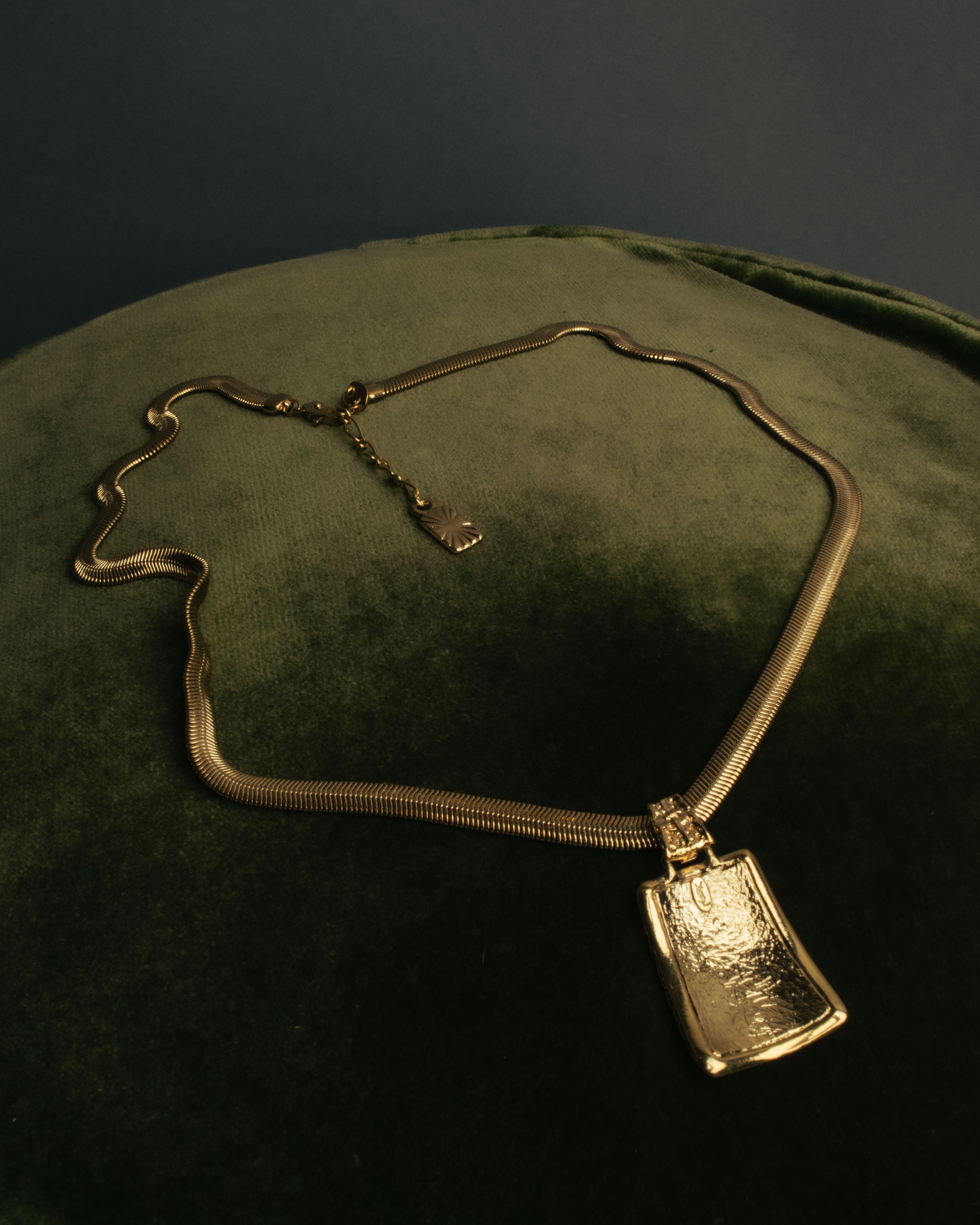 "Yves Saint Laurent" 80's-00's Gold tone textured pendant necklace