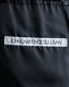 "JOHN LAWRENCE SULLIVAN"
 Large lapel double-breasted mid length coat