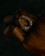 "Alexandar McQueen" Horseshoe motif red stone top ring