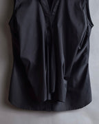 "Yves Saint Laurent Rive Gauche"
Twisted front sleeveless shirt