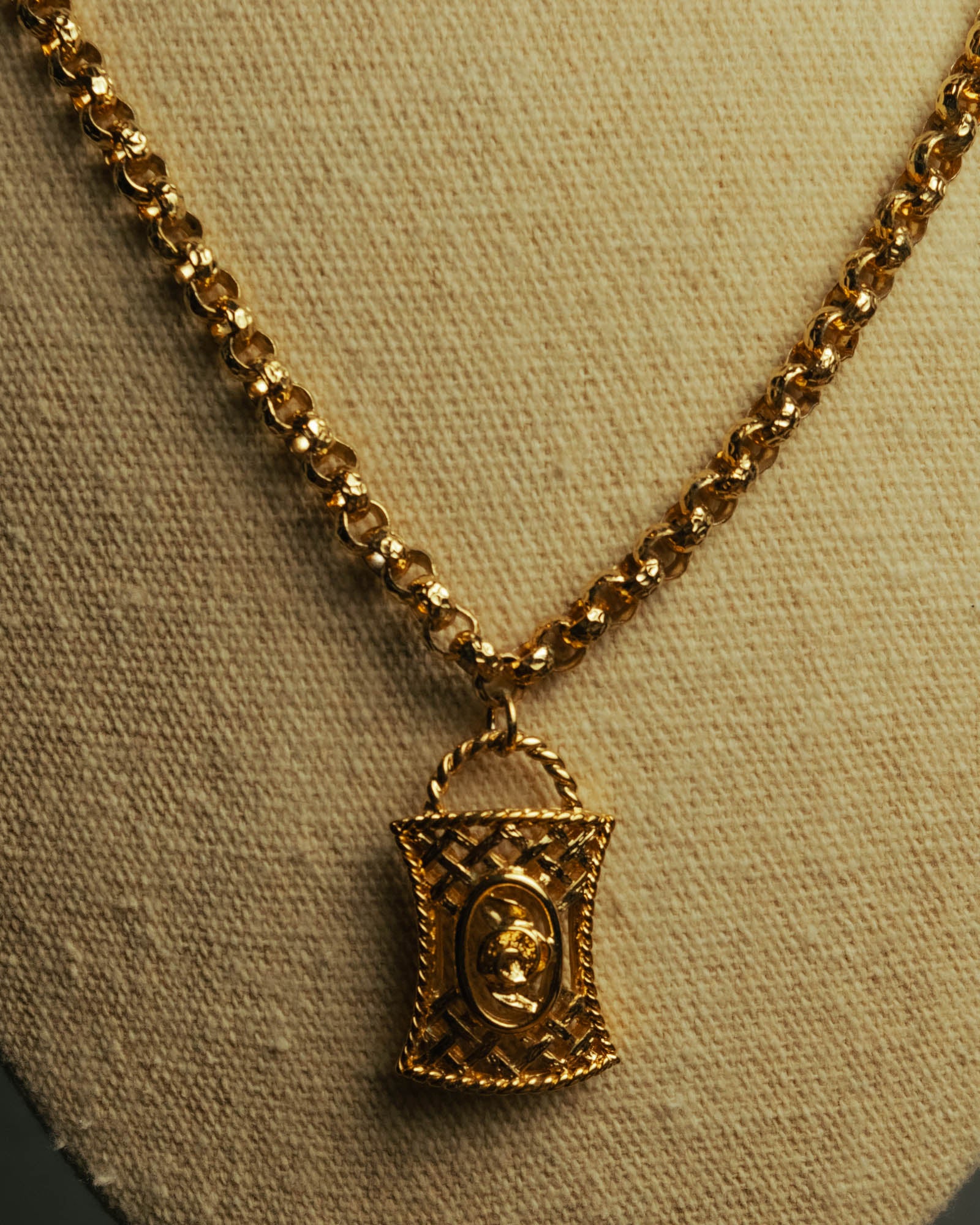 “NINA RICCI” Late 80’s-90’s gold tone openwork pendant necklace
