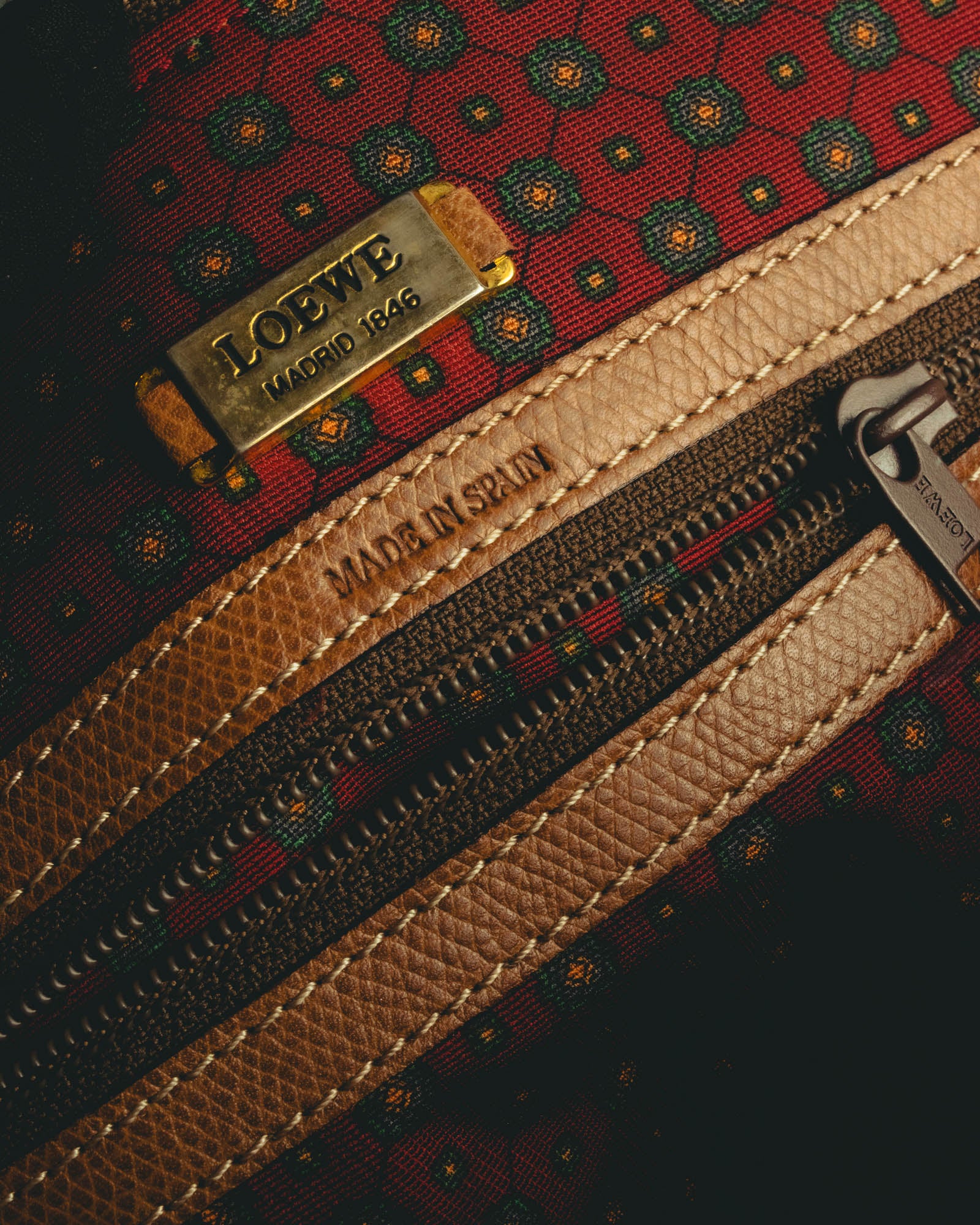 "LOEWE" 80s–00's logo embossed leather handbag