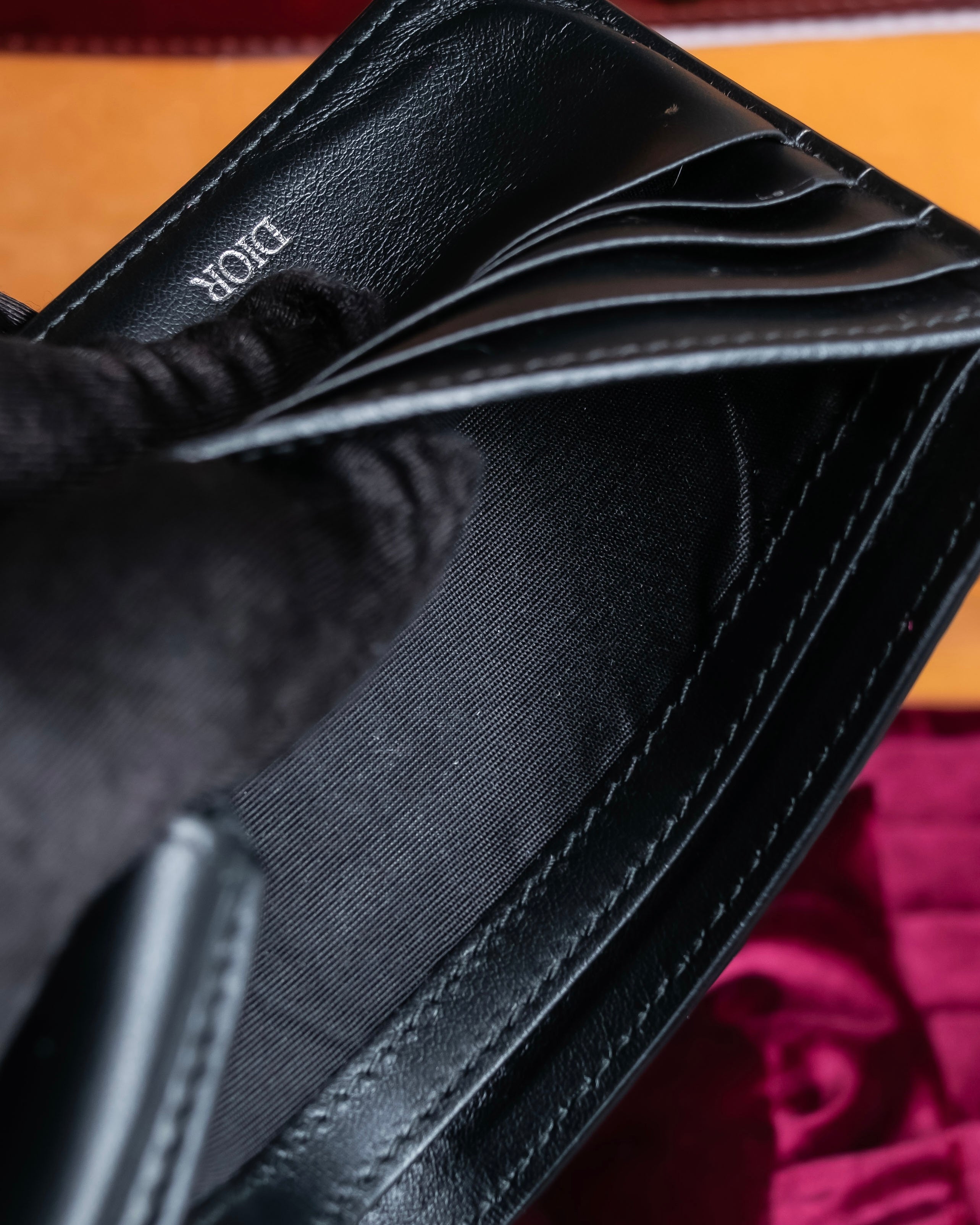 "Dior" Logo engraved bi-fold leather wallet