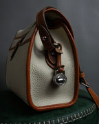 "Dooney & Bourke" Patch front design Two-tone leather shoulder bag