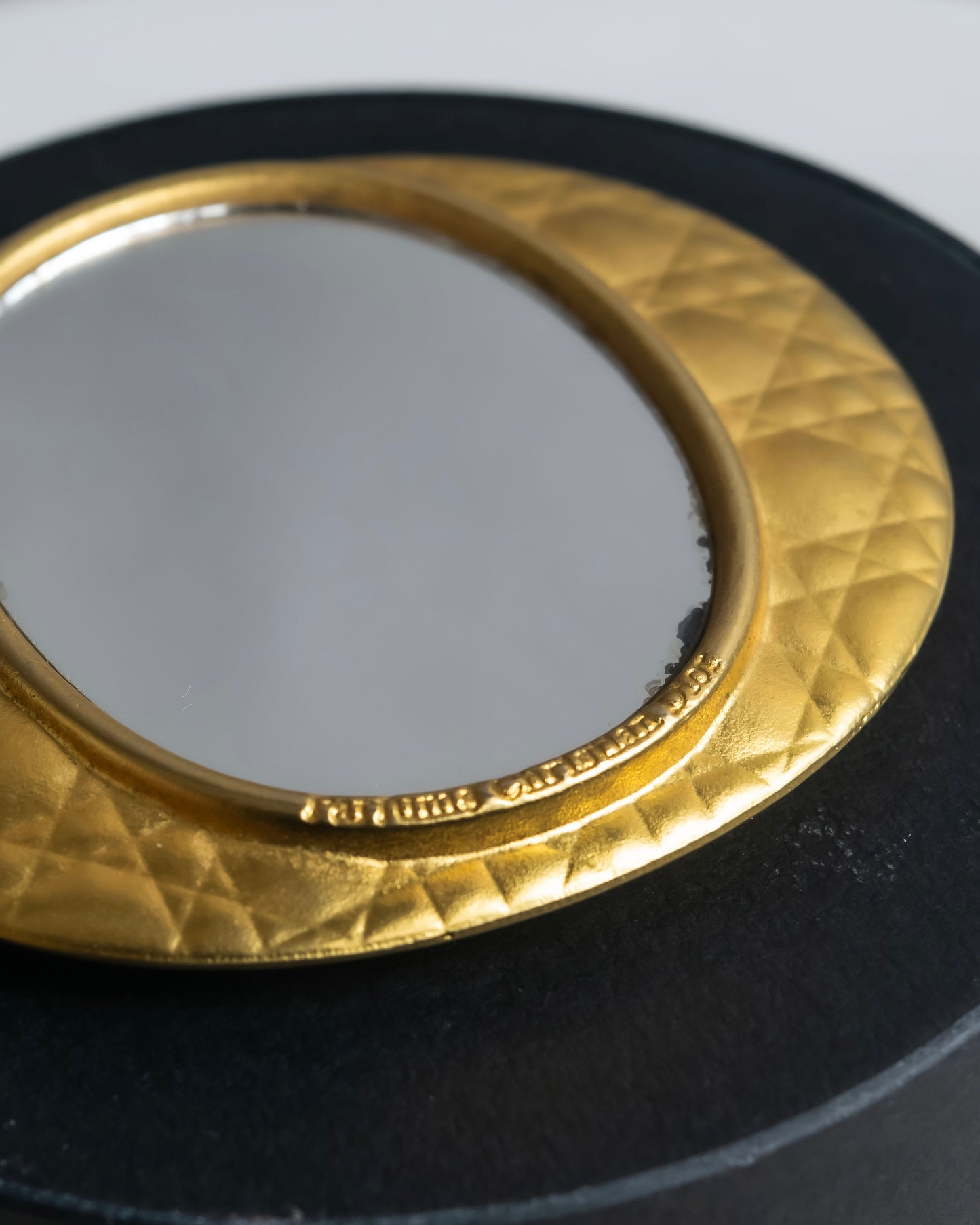 "Christian Dior" Cannage pattern engraved gold hand mirror