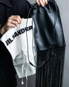 “JIL SANDER” Fringe detail flat drawstring shoulder bag