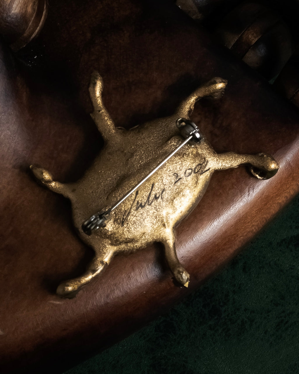 "Jerry Robertson design clock motif brooch"